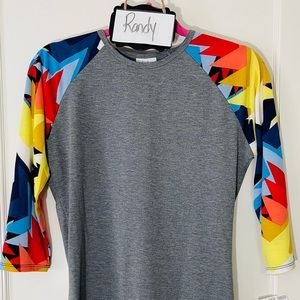 Lularoe brand Randy style baseball shirt. 3/4 length sleeves. New with tags.
